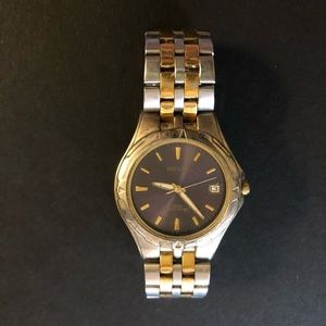 Pulsar watch gold/silver water resistant/calendar